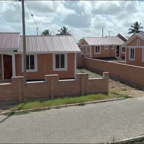 Close view of a completed NHC housing unit frontage and entrance porch