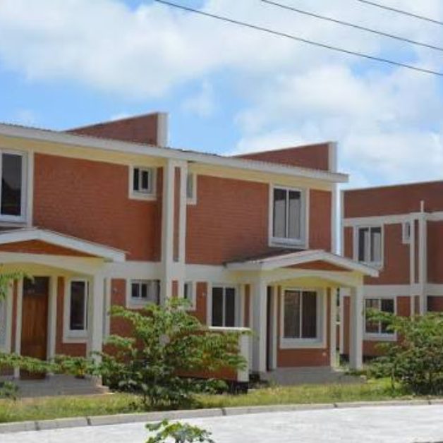 Completed two-storey residential units with entrance porches and landscaping