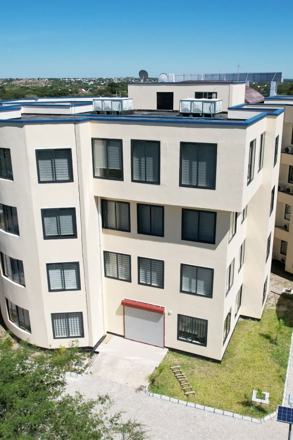 The completed accommodation block alongside the TRA Simiyu office