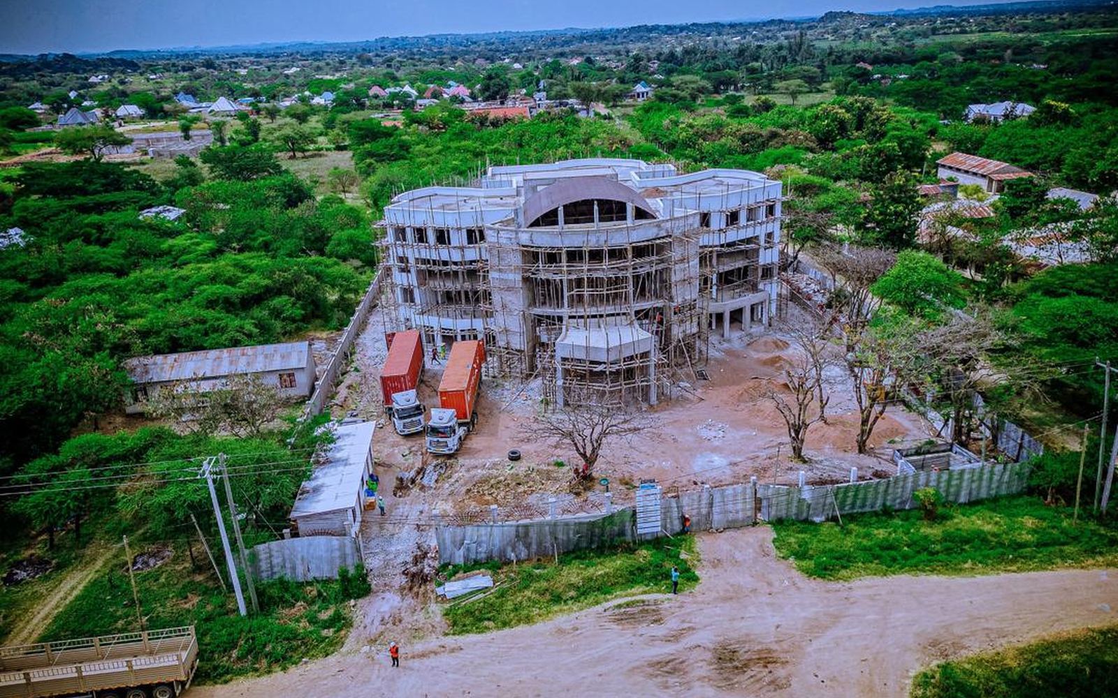 Aerial view of the reinforced concrete frame and roof structure under construction