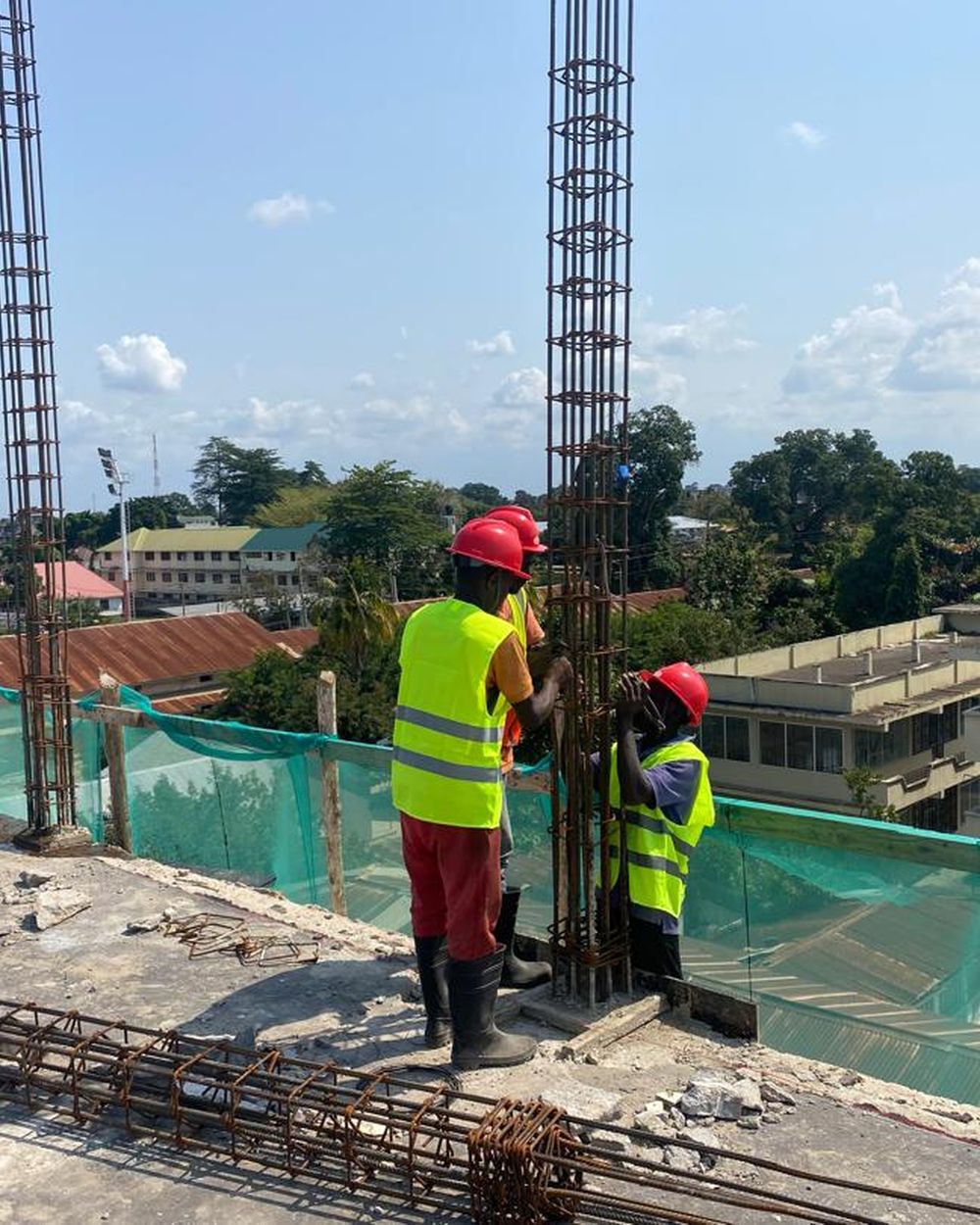 Steel fixers tying column reinforcement on the TRA Tanga rehabilitation